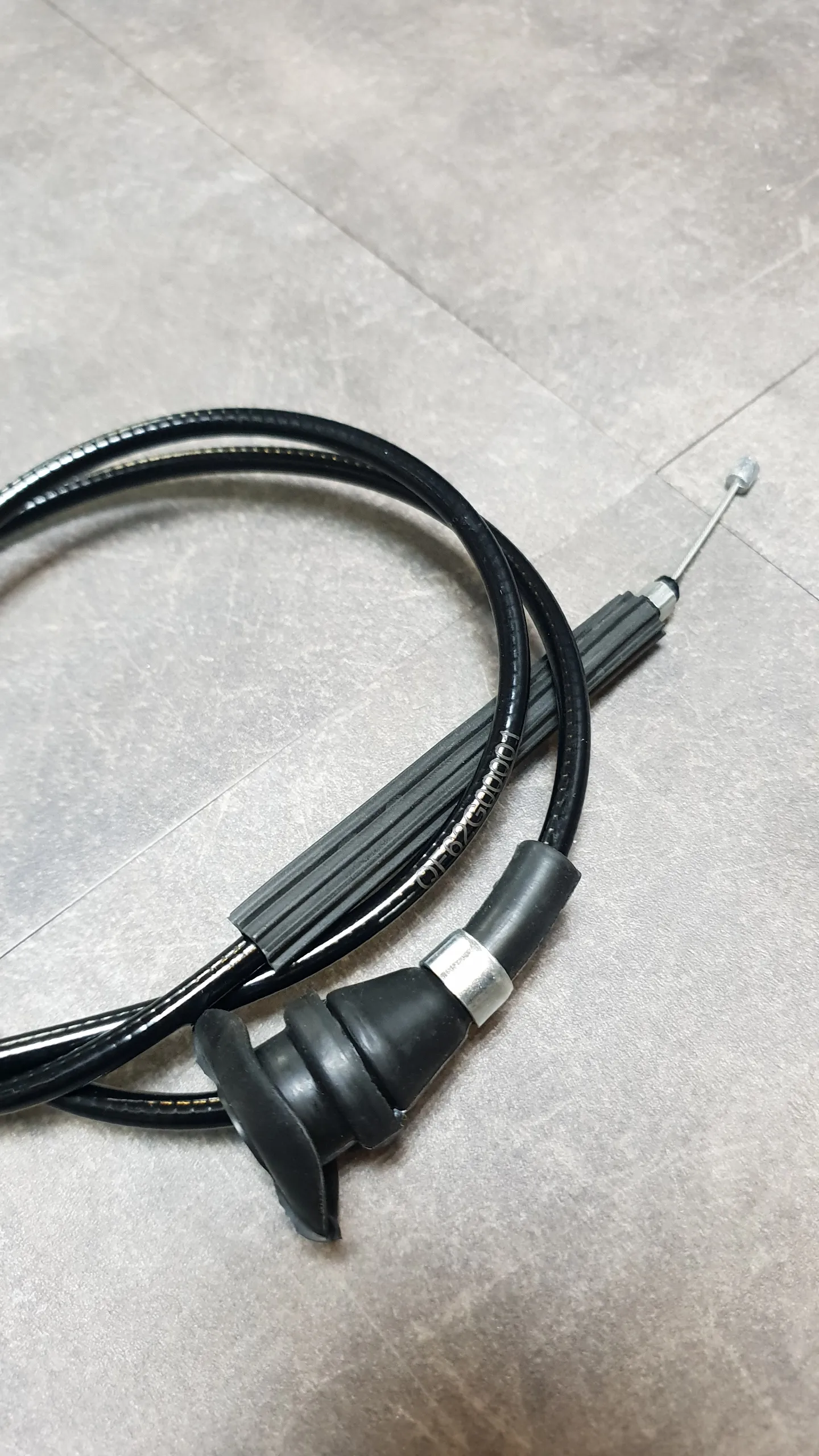 Трос капота E53 (привод капота)